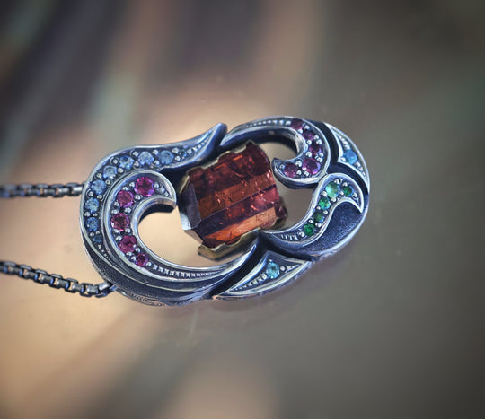 Tourmaline crystal pendant made with silver and gold