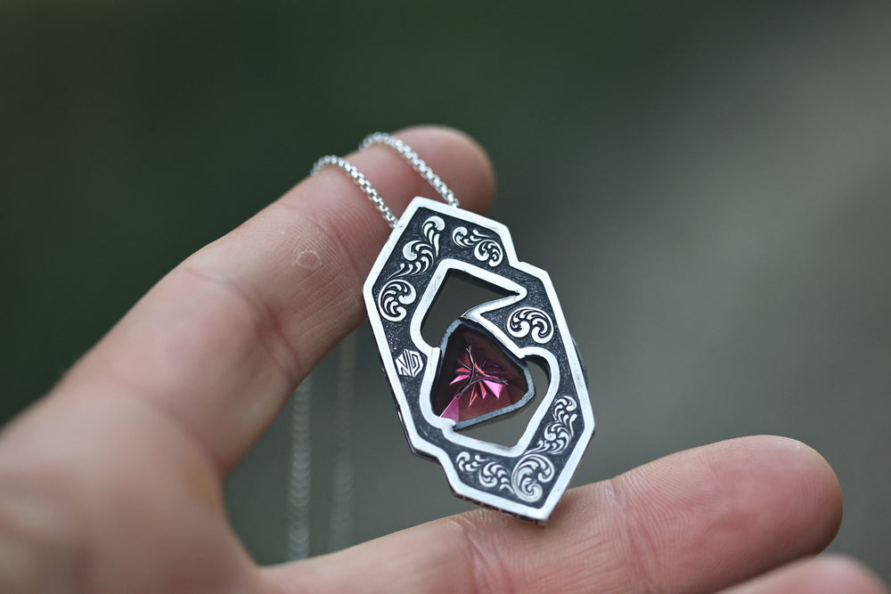 22 karat gold and silver pendant with Rubellite tourmaline.