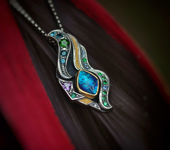 Silver and gold black opal pendant