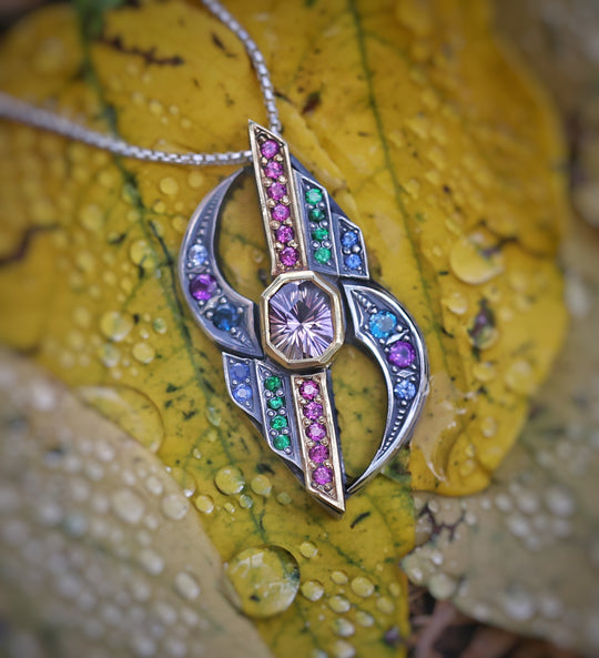 tourmaline sunburst silver and gold pendant