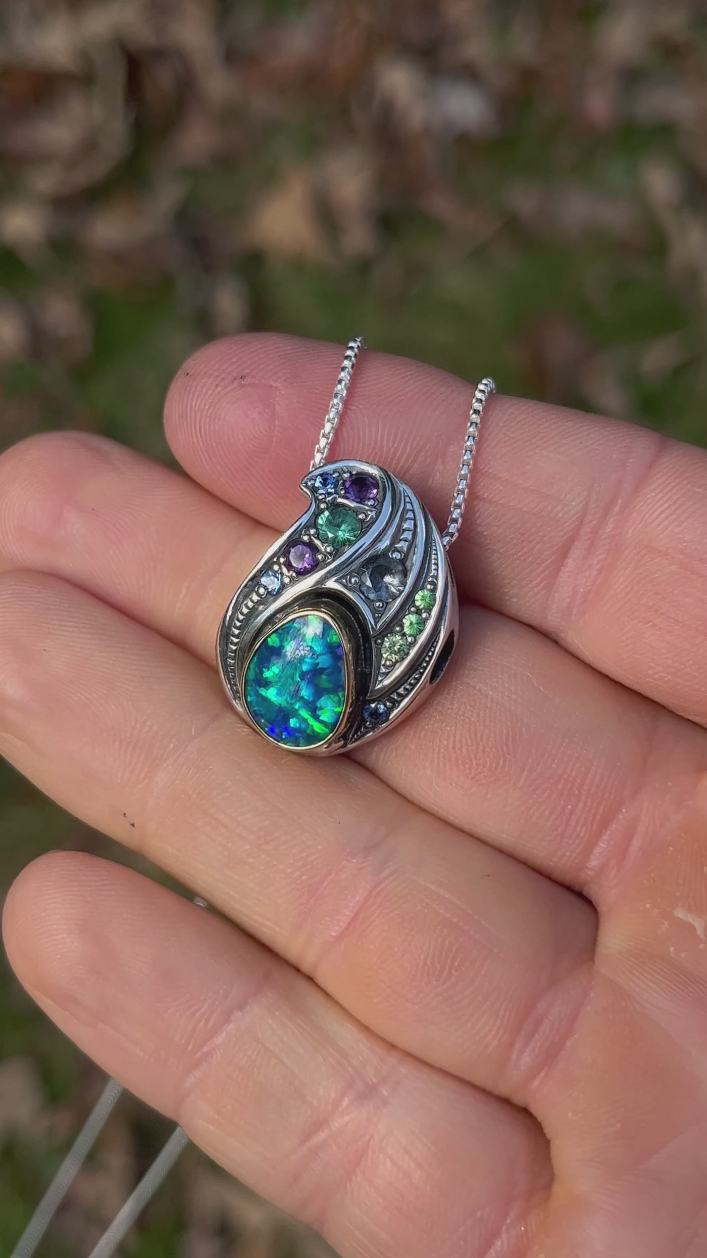 Opal pendant with silver and gold